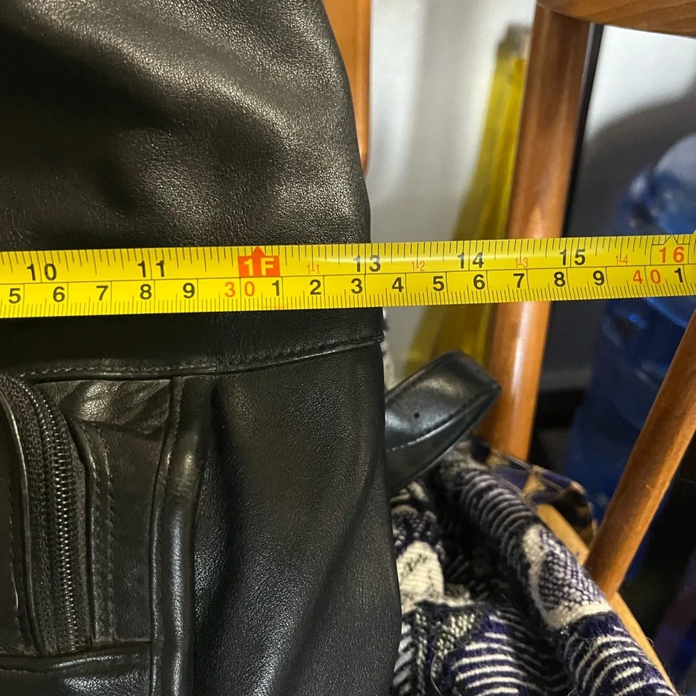 Vintage 90’s Tumi drawstring leather mini backpack